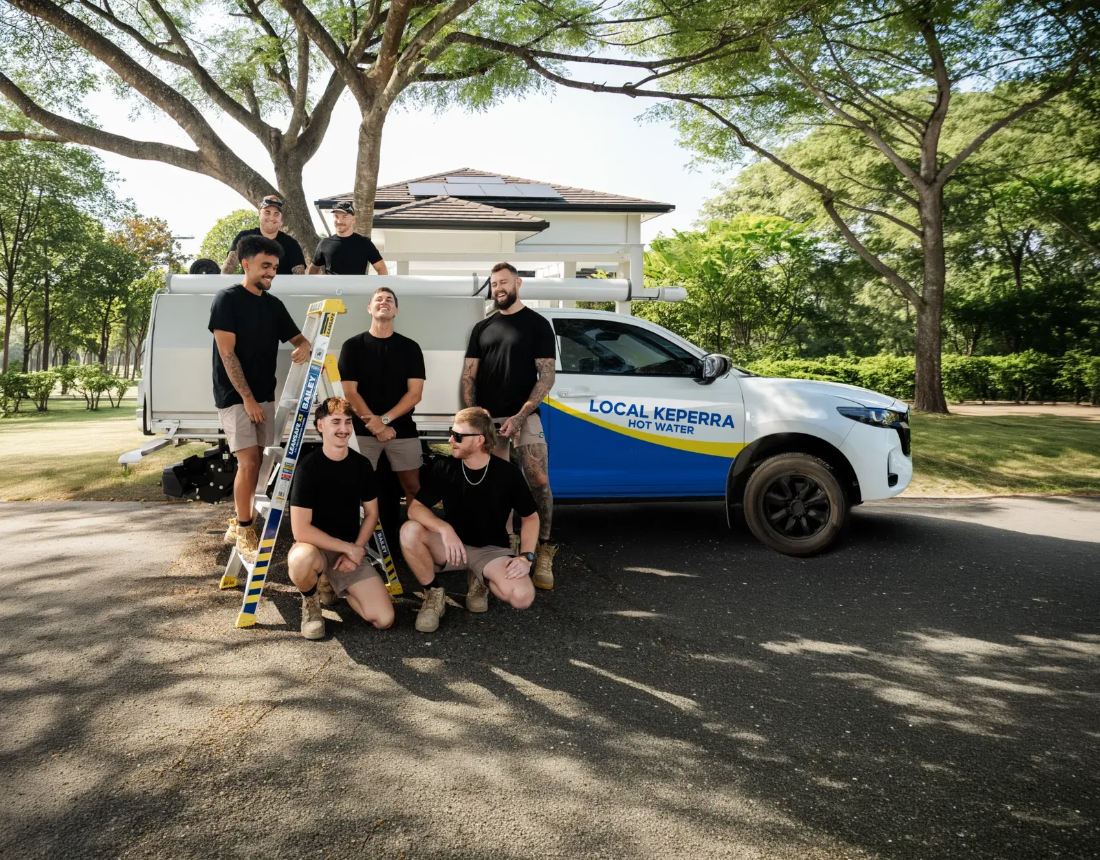 Local Keperra Hot Water ute and team